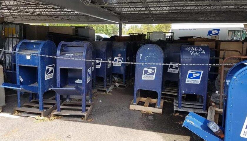 USPS removes mail collection boxes and reduces hours as Trump administration accused of voter suppression