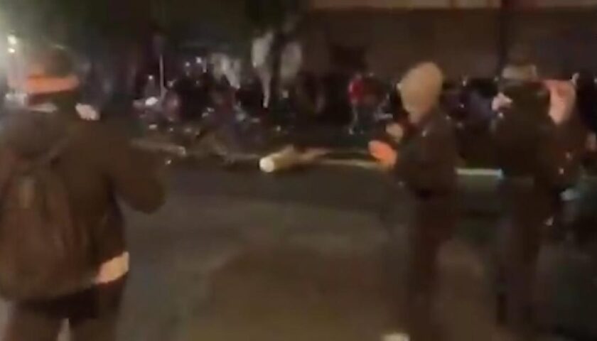 Officer captured on video riding bicycle over protester's head placed on leave
