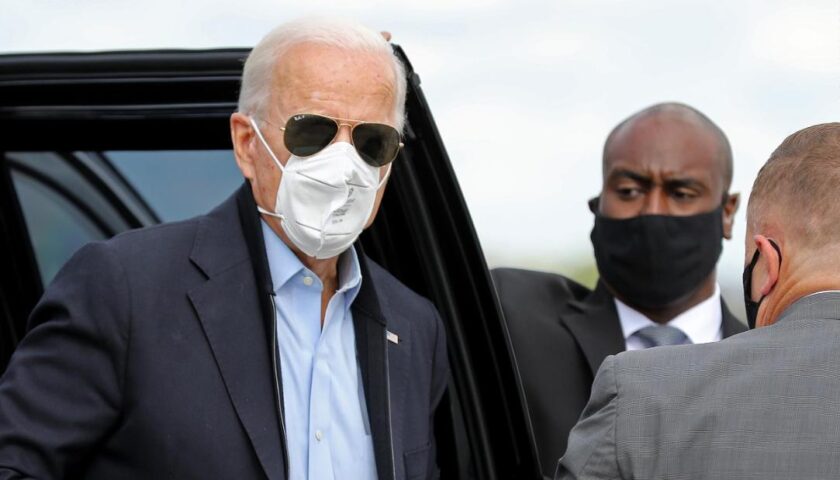 Trump campaign adviser claims Biden's mask is a 'prop' as President hospitalized with Covid-19