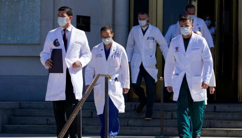 Trump's doctor walks backs comments on timing of President's Covid-19 diagnosis and treatment